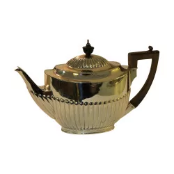 silver teapot with wooden handle. 19th century